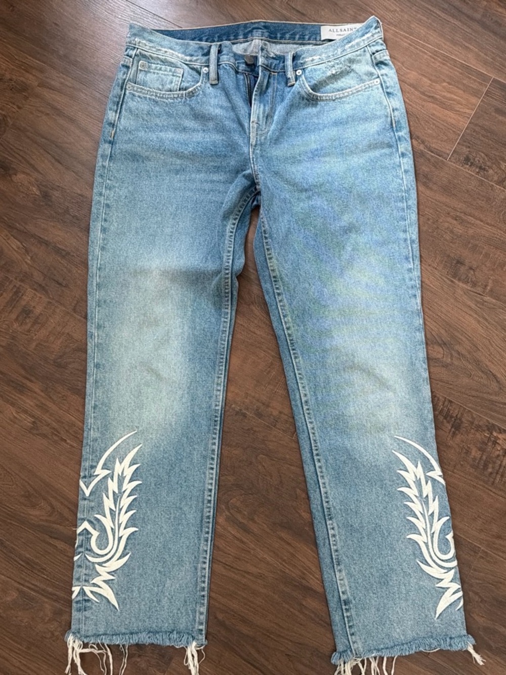 All Saints Light Blue Cropped Jeans with White Embroidered Lower Legs